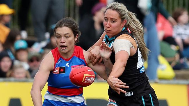 Ellie Blackburn and Jacqui Yorston contest for possession. Picture: Sarah Reed/AFL Photos via Getty Images