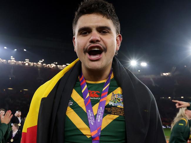 Latrell Mitchell with his winner’s medal and Aboriginal flag after the World Cup final between Australia and Samoa.