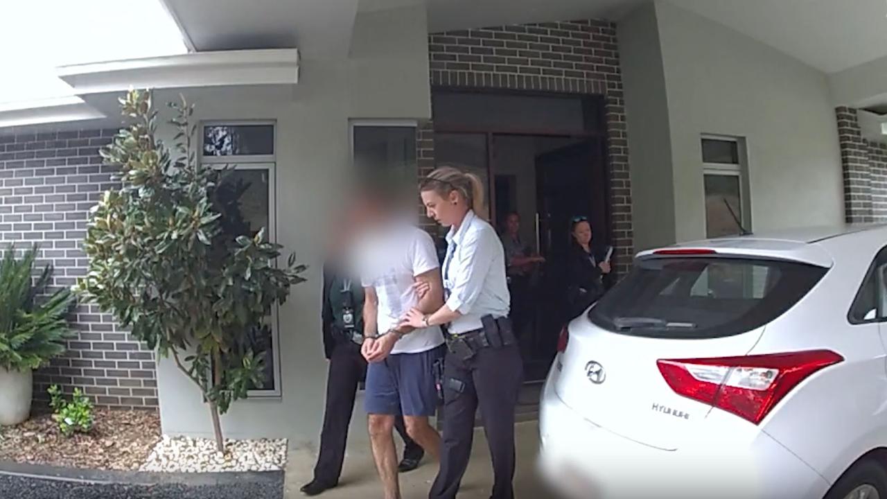 Air Force pilot Robert Crawford being arrested. Picture: Queensland Police