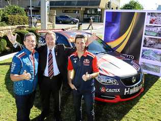 In this file photo Supercars Championship drivers Craig Lowndes and Jamie Whincup are seen here with dismissed Ipswich councillor Paul Tully. Picture: David Nielsen