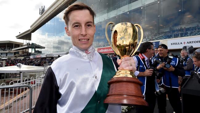 Cory Parish with the Caulfield Cup. Picture: Jay Town