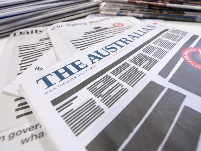 A selection of Nine and News Corp newspapers are seen in Sydney, Monday, October 21, 2019.  The front pages of the major newspapers on Monday replicated a heavily redacted government document, alongside an advertising campaign challenging laws that effectively criminalise journalism and whistleblowing. (AAP Image/Danny Casey) NO ARCHIVING