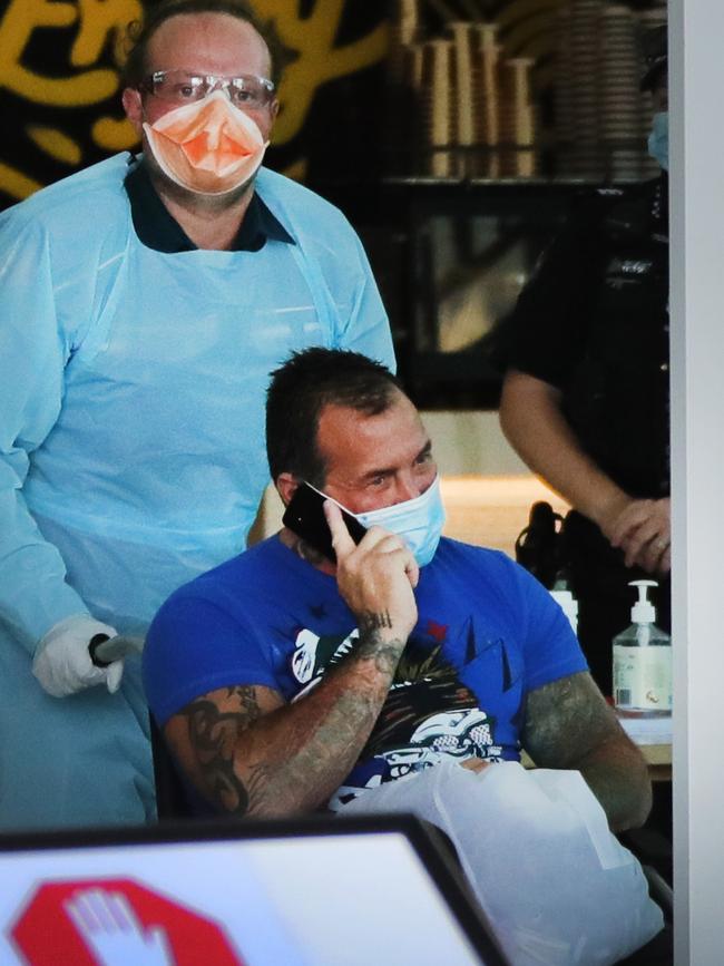 Bowden is wheeled out of a Surfers Paradise hotel on the way to Gold Coast University Hospital. Picture: Glenn Hampson