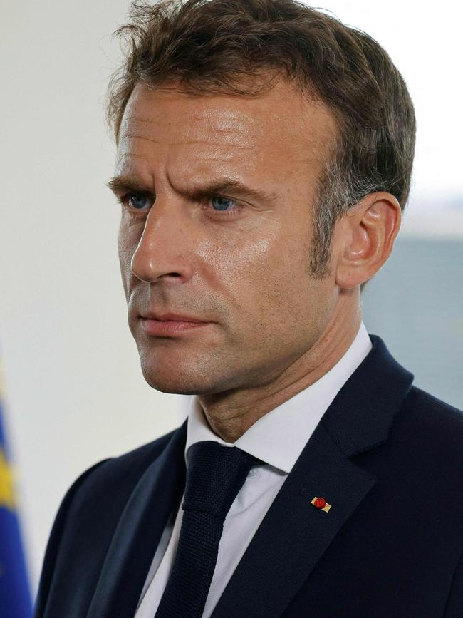 French President Emmanuel Macron speaks to members of the press in New York on September 21, 2022. (Photo by Ludovic MARIN / AFP)