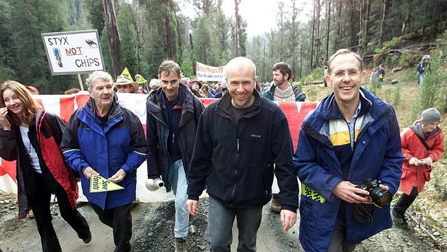 Social conscience: From left, Peter Cundall, Geoff Law, Flanagan and Bob Brown front a 2005 anti-woodchipping protest march at the<a href="https://www.themercury.com.au/business/native-forest-clash-over-styx-valley-are-we-heading-intohttps:/www.themercury.com.au/business/native-forest-clash-over-styx-valley-are-we-heading-into-another-forestry-war/news-story/15e0f7922740277bb22f12ab5cbef6d3-another-forestry-war/news-story/15e0f7922740277bb22f12ab5cbef6d3">Styx Valley, home of giant eucalyptus regnans and temperate rainforest in 2005</a>. Picture: EDDIE SAFARIK