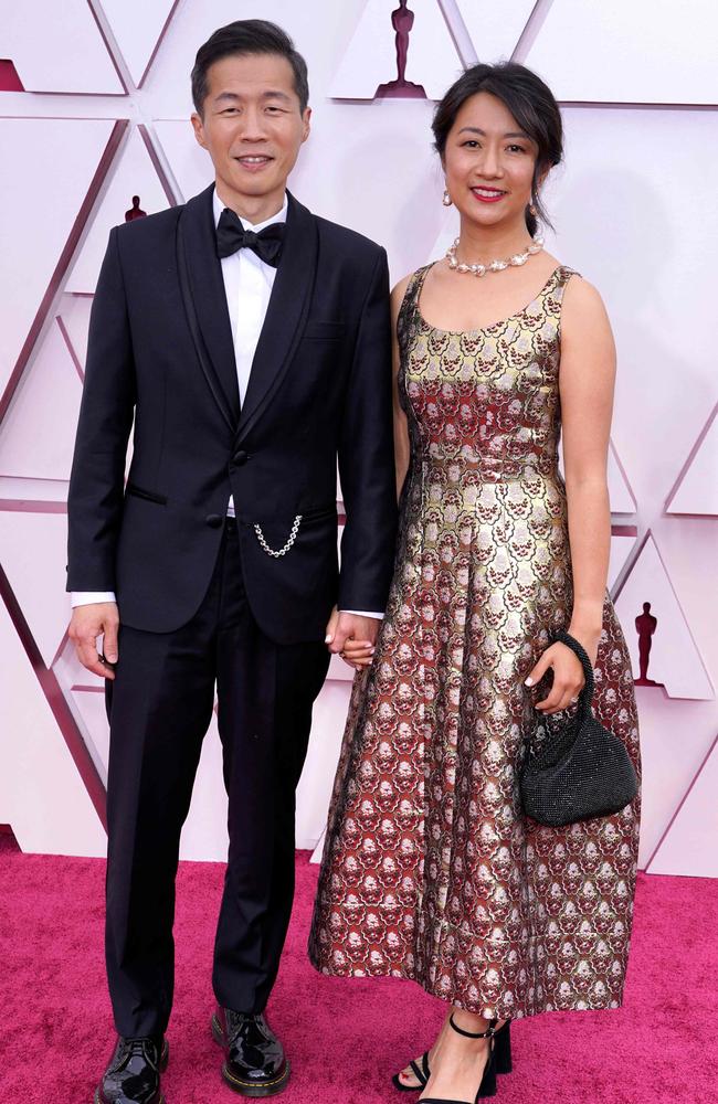 Lee Isaac Chung, of Minari, who is nominated for Best Director, and Valerie Chung. Picture: Chris Pizzello / POOL / AFP