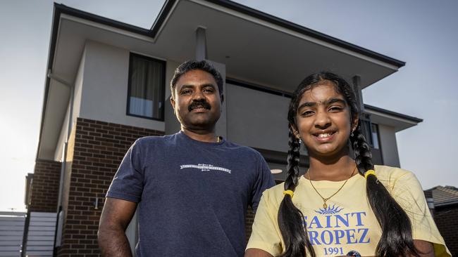 Muthu and his family have made significant financial sacrifices to pay their mortgage repayments since interest rates skyrocketed. Muthu Mahesh and his daughter Ashwa (11). Picture: Jake Nowakowski