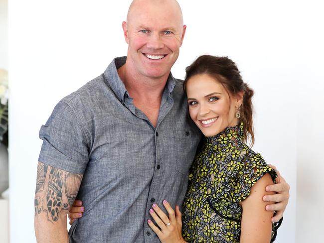 Barry Hall, with partner Lauren Brant, has apologised for his vulgar comments. Picture: Nigel Hallett