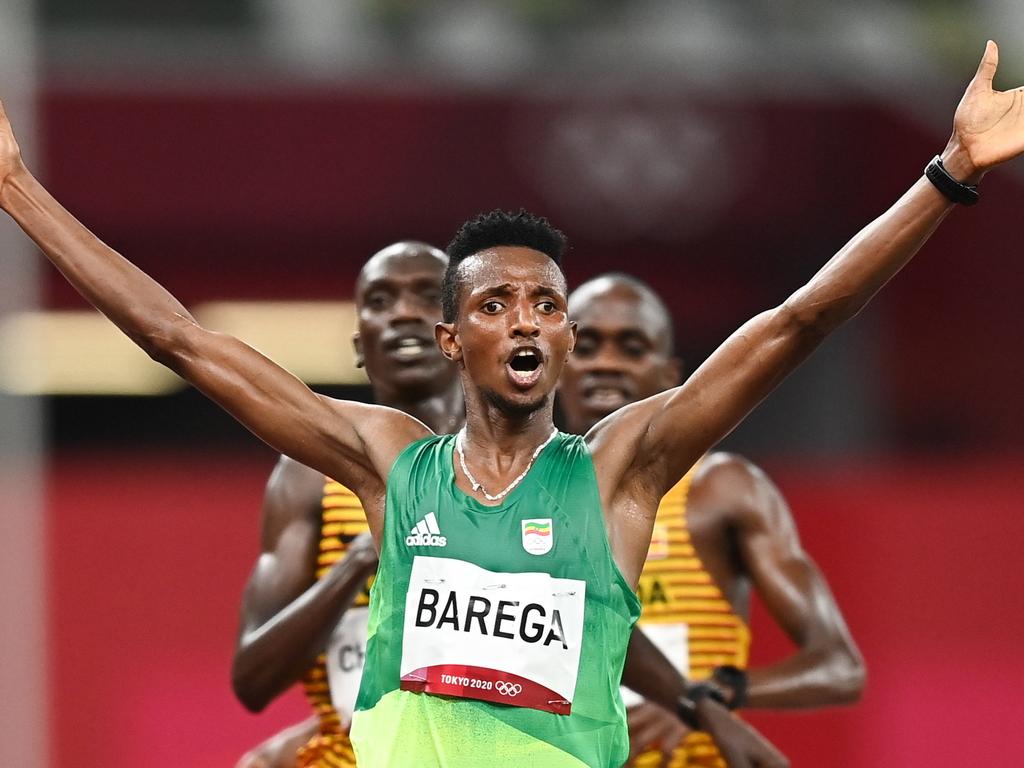 Selemon Barega of Ethiopia celebrates winning the men's 10,000m. (Photo By Ramsey Cardy/Sportsfile via Getty Images)