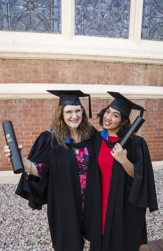 Bachelor of Nursing graduates Louise McDonald (left) and Ana Malferrari at a UniSQ graduation ceremony at Empire Theatres, Tuesday, October 31, 2023. Picture: Kevin Farmer