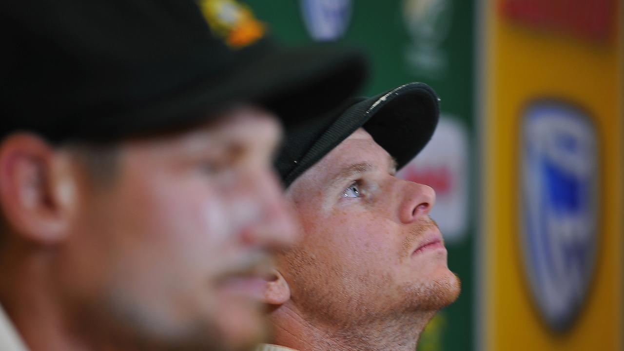 Rock bottom: Cameron Bancroft (left) sits with then captain Steve Smith at their infamous press conference. Picture: Getty