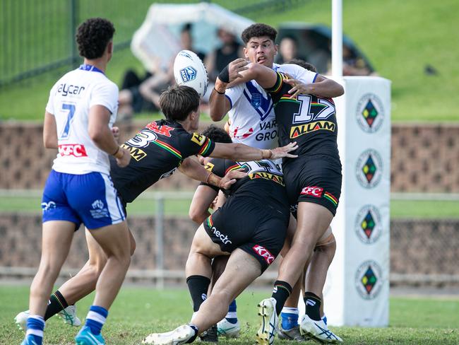 Hunter Bell picks up lose ball from Bulldogs player Paul Johnson to set up a try for Panthers. Picture: Julian Andrews