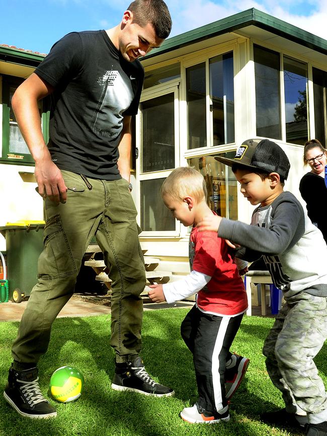 Socceroos goal keeper Mat Ryan said he missed kicking a ball about with his young cousins Konner Smith and Bowen Jansen. The trio were reunited in the family at home in Shalvey. Picture: John Appleyard.