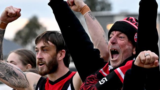 Western Rams coach Ash Pritchard (right) celebrates after beating North Sunshine. Picture: Andy Brownbill