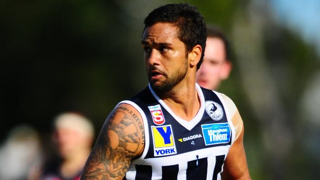 Peter Burgoyne in action for Port Adelaide in the SANFL.