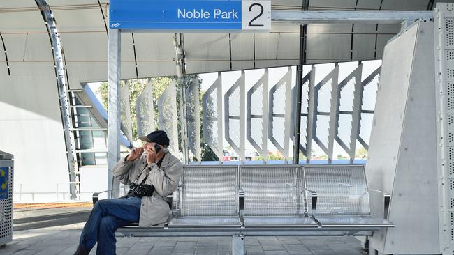 A man takes a seat at the new Noble Park Station. Picture: Jason Edwards