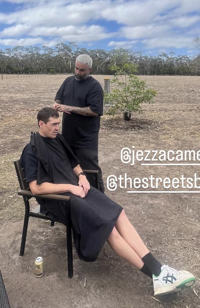 Jeremy Cameron gets a pre-wedding haircut.