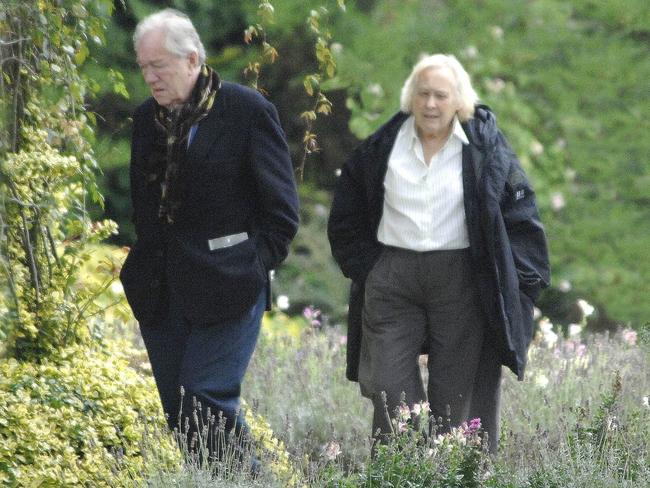 Sir Michael and Lady Anne Gambon walking in the garden of their home in Gravesend, Kent, in 2008. Credit: Shutterstock