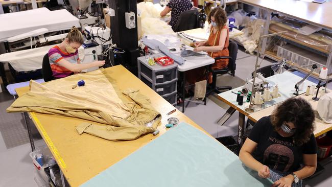 The costume creators hard at work on the Hamilton designs. Picture: Tim Hunter