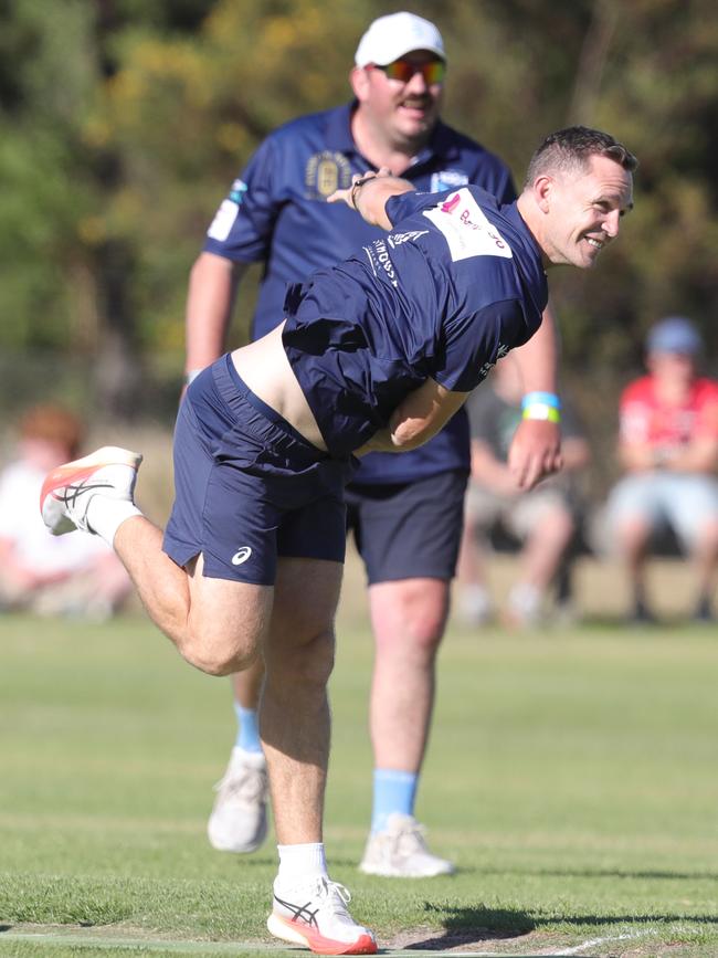 Joel Selwood bowls a delivery on Sunday, as Sam Schaller watches on. Picture: Mark Wilson