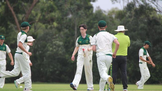 Matthew Pereira of St Patrick’s College collects his hat last Saturday.