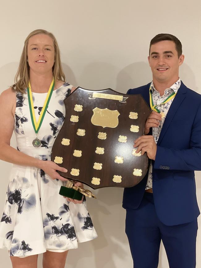 Cairns District Rugby League 2021 Deb Gallop Medal winner Jo Kerr and Gold Medal winner Jacob Wallace, both of Ivanhoe Knights, with the club’s Jack Seary Club Champions Shield.