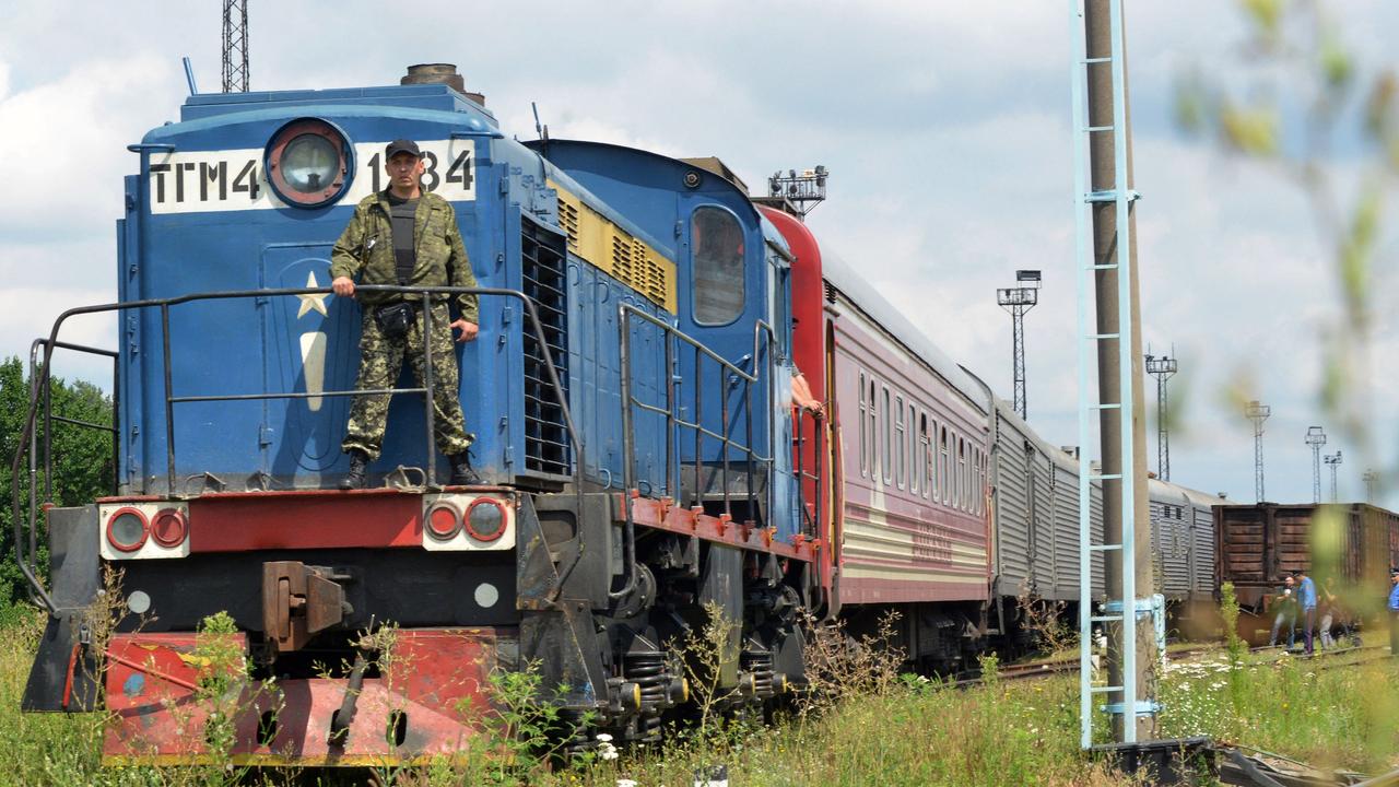 The train carrying bodies recovered from the downed flight arrives at the Malyshev Plant in Kharkiv on July 22, 2014. Picture: Sergey Bobok / AFP