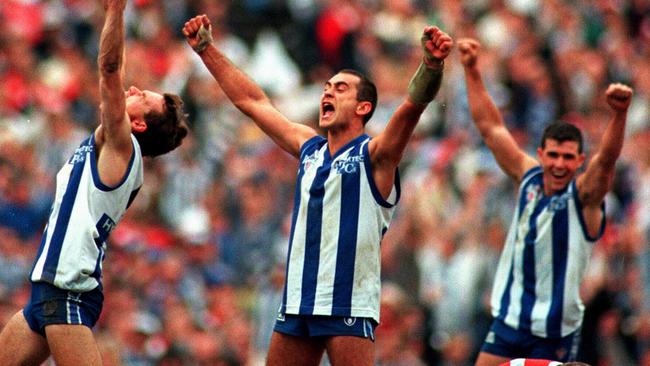 Dean Laidley, Wayne Schwass &amp; Anthony Stevens celebrate their Grand Final win in 1996.