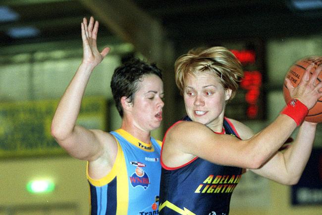 Basketballer Kristen Veal with Erin Phillips during an Adelaide Lightning vs Canberra Capitals match at Wayville in 2003.