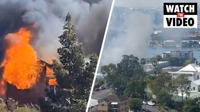 House fire beside petrol station at Newstead