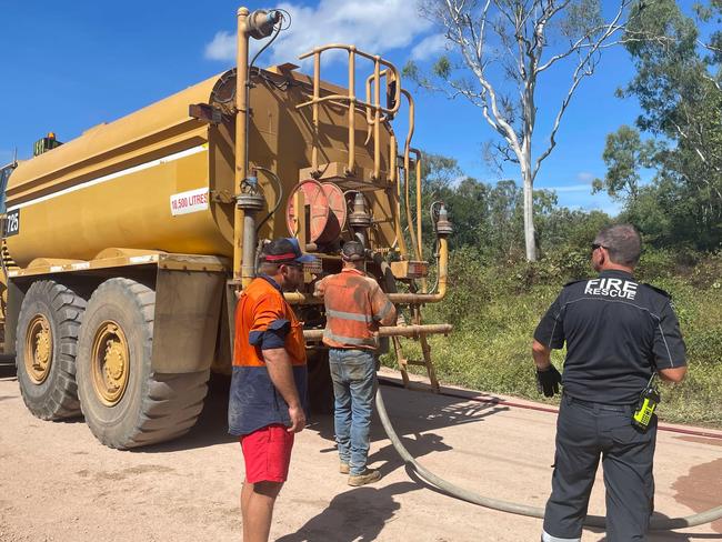 A water tanker was needed to be hooked up to an urban unit of the Queensland Fire Brigade to tackle the Roseneath shed fire. Picture: Leighton Smith.