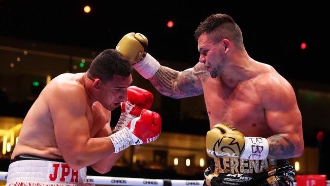 Kevin Lerena punches Justis Huni during the WBO Global Heavyweight Title fight on the Knockout Chaos boxing card at the Kingdom Arena in Riyadh, Saudi Arabia. (Photo by Richard Pelham/Getty Images)