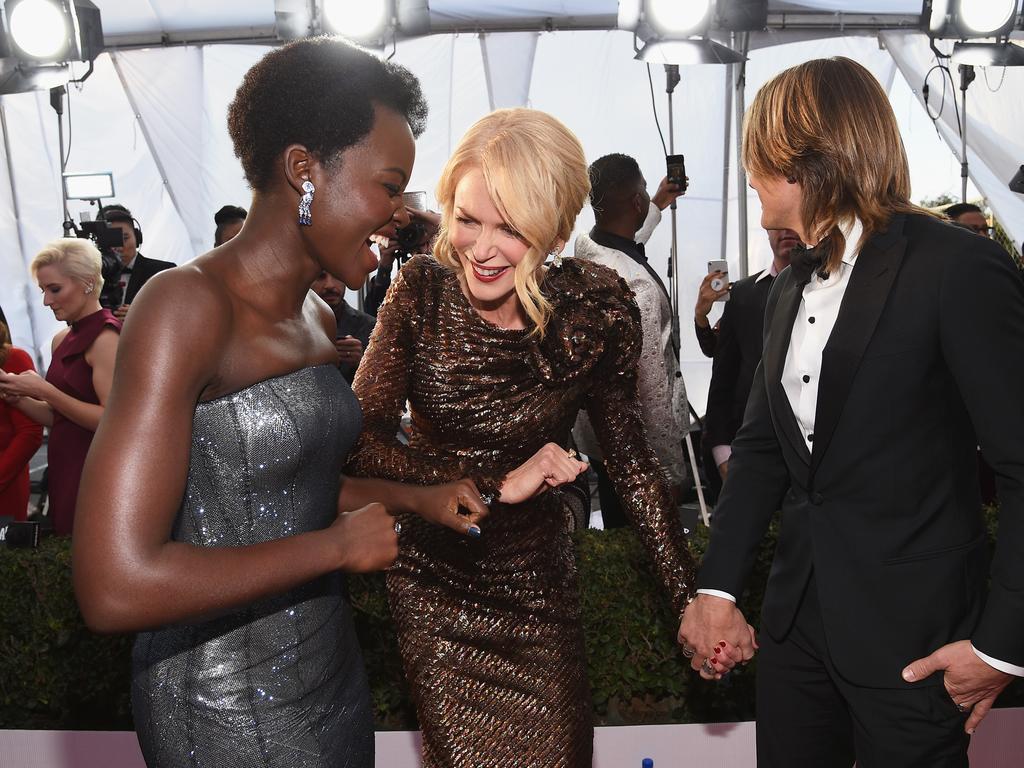 Lupita Nyong’o, Nicole Kidman and Keith Urban attend the 24th Annual Screen Actors Guild Awards at The Shrine Auditorium on January 21, 2018 in Los Angeles, California. Picture: Getty