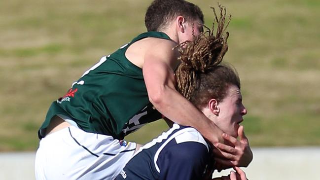 Hampden’s Toby Jennings puts in a high tackle in the interleague match against Ballarat. Picture: Yuri Kouzmin