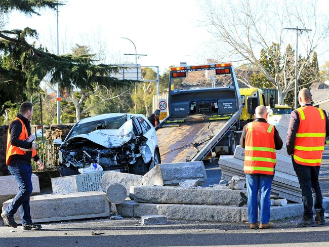 The car is towed from the scene. Picture: Mark Stewart