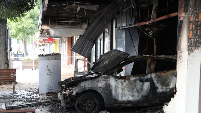 Bailey Hobbs is facing charges in relation to a spate of firebombings such as at this tobacco shop in Altona. Picture: David Crosling