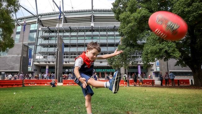 James, 6, outside the MCG for the Round 1 clash between Melbourne and Fremantle. Picture: Ian Currie