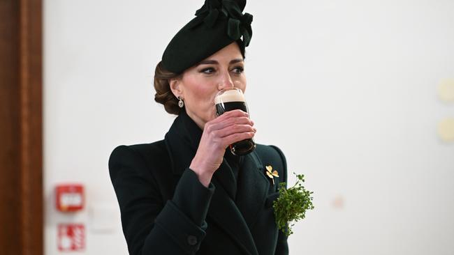 Catherine, Princess of Wales in her role as Colonel, Irish Guards, takes a sip of Guinness during a visit to the 2025 Irish Guards' St. Patrick's Day Parade at Wellington Barracks in London. Picture: Getty Images.