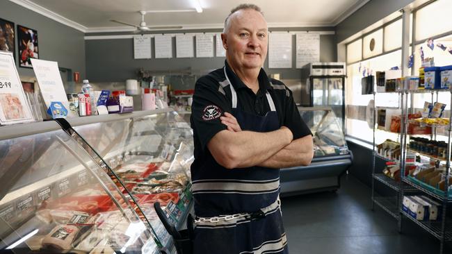 Local butcher Darryl Whitelaw is one of many business owners who have had to discard rotten foodstuffs. Picture: Richard Dobson