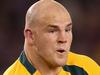 MELBOURNE, AUSTRALIA - JUNE 29: Stephen Moore of the Wallabies passes the ball during game two of the International Test Series between the Australian Wallabies and the British & Irish Lions at Etihad Stadium on June 29, 2013 in Melbourne, Australia. (Photo by David Rogers/Getty Images)