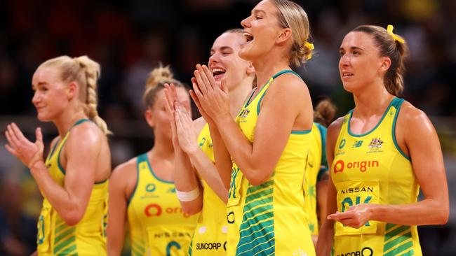 The Australian players cheer as Amy Parmenter of Australia is presented the player of the match award during game two of the International Test series between the Australia Diamonds and the England Roses. Picture: Mark Kolbe/Getty