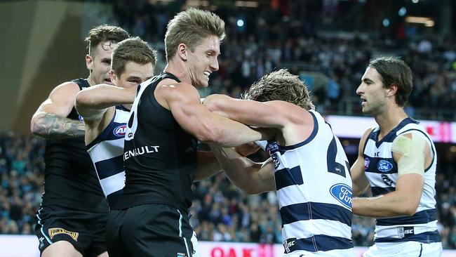 AFL — Port Adelaide v Geelong at Adelaide Oval. Tempers Flare. Hamish Hartlett and Josh Caddy. Picture Sarah Reed