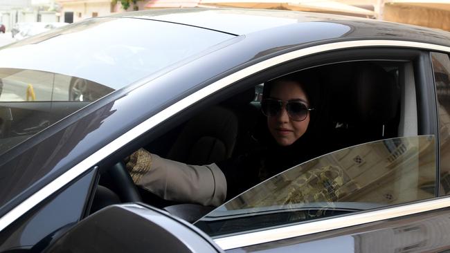 Daniah al-Ghalbi, a newly-licensed Saudi woman driver, sits in her car during a test-drive in the Red Sea resort of Jeddah. Picture: AFP