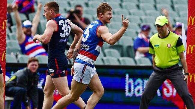 Joshua Glenn celebrates a goal for Central District against Norwood in last year’s elimination final. Picture: Tom Huntley