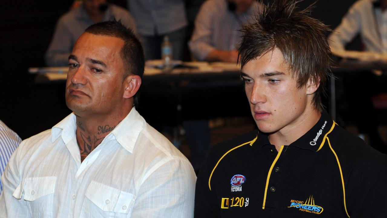 Martin with his late father Shane on AFL Draft night in 2009.