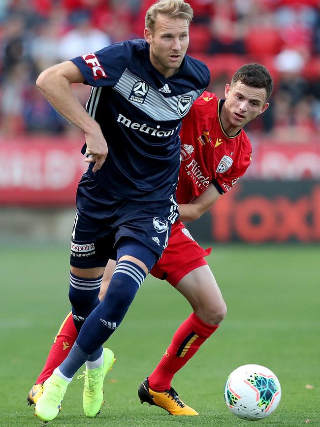 Louis D’Arrigo pressures Swedish star Ola Toivonen. Picture: AAP Image/James Elsby