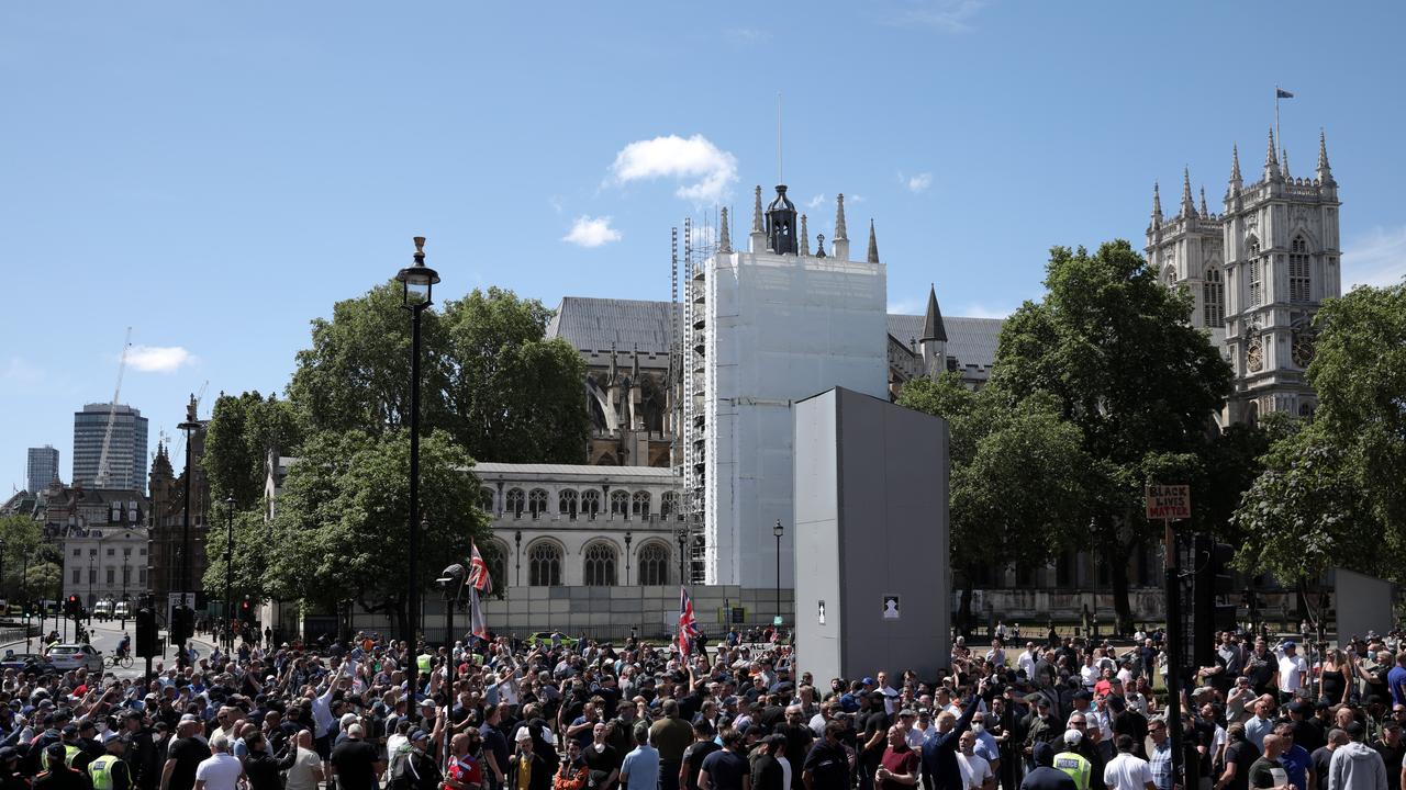 A group gathers around the Winston Churchill statue on parliament Square. Picture: Dan Kitwood/Getty Images