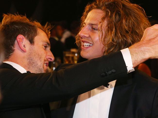 MELBOURNE, AUSTRALIA - SEPTEMBER 28: Michael Barlow hugs teammate Nat Fyfe of the Dockers who celebrates winning the 2015 Brownlow Medal at Crown Palladium on September 28, 2015 in Melbourne, Australia. (Photo by Michael Dodge/AFL Media/Getty Images)