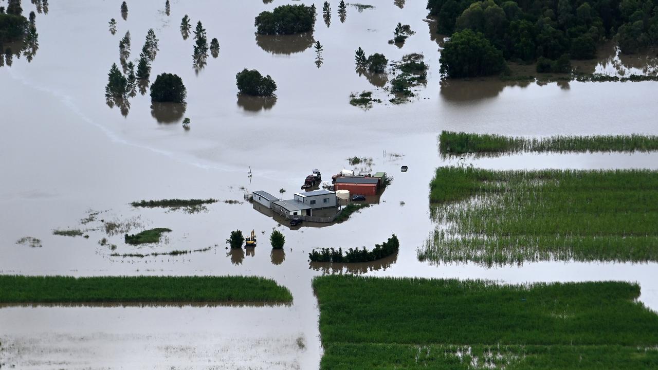 A house surrounded by floodwaters in the town of Yandina. Picture: Bradley Kanaris/Getty Images