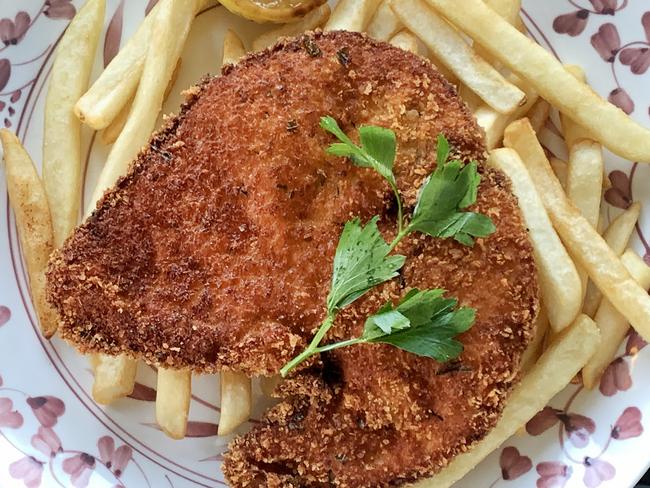 Embargoed for The Daily Telegraph. The new Five Dock Bowling Club has just opened this week. Restaurant Skinny Tony's has a Chicken Schnitzel: $28.90, Fried chicken breast crumbed, w. parmesan cheese & parsley, Add Fries $6.90, Add Side Salad $8.90,  . Picture Rohan Kelly